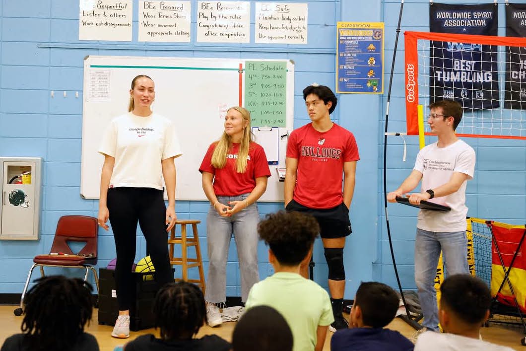 UGA students introduce themselves to CCSD students in a gym classroom
