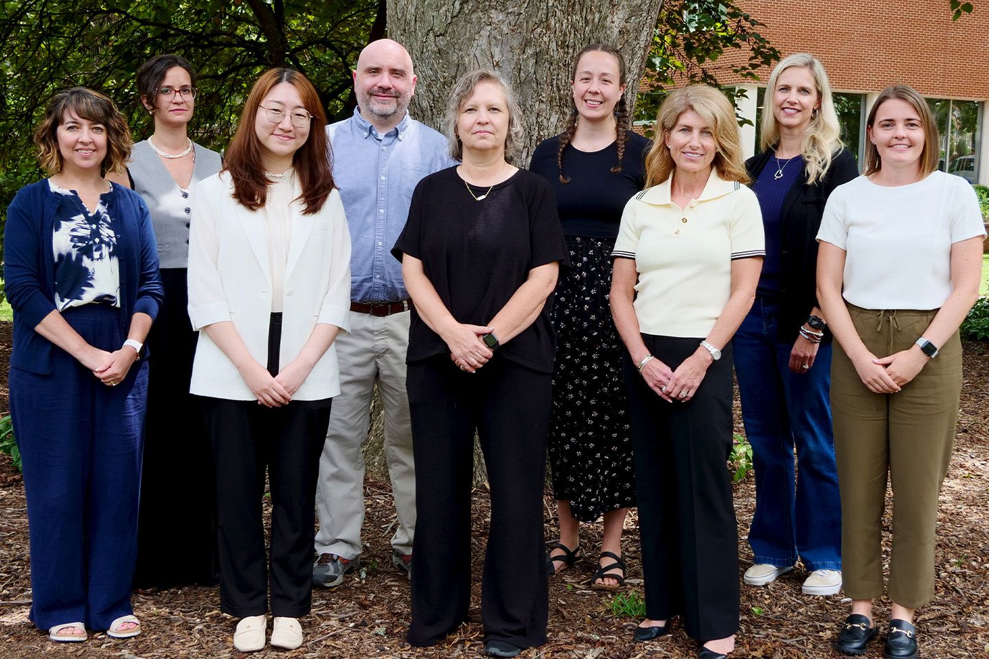 Group photo of the nine faculty in the Service-Learning Fellows cohort