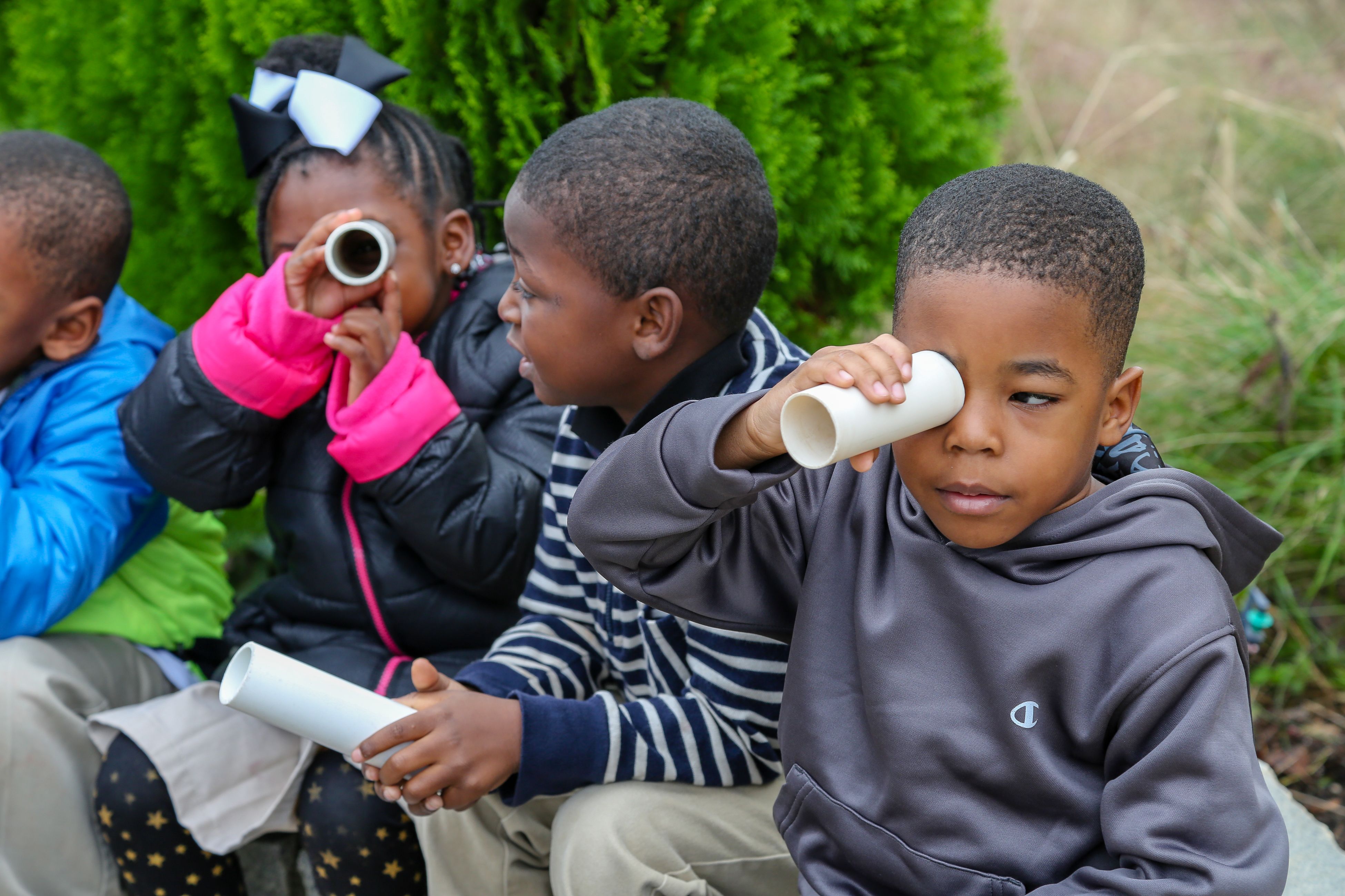 Elementary school students participate in an activity on an Experience UGA trip.