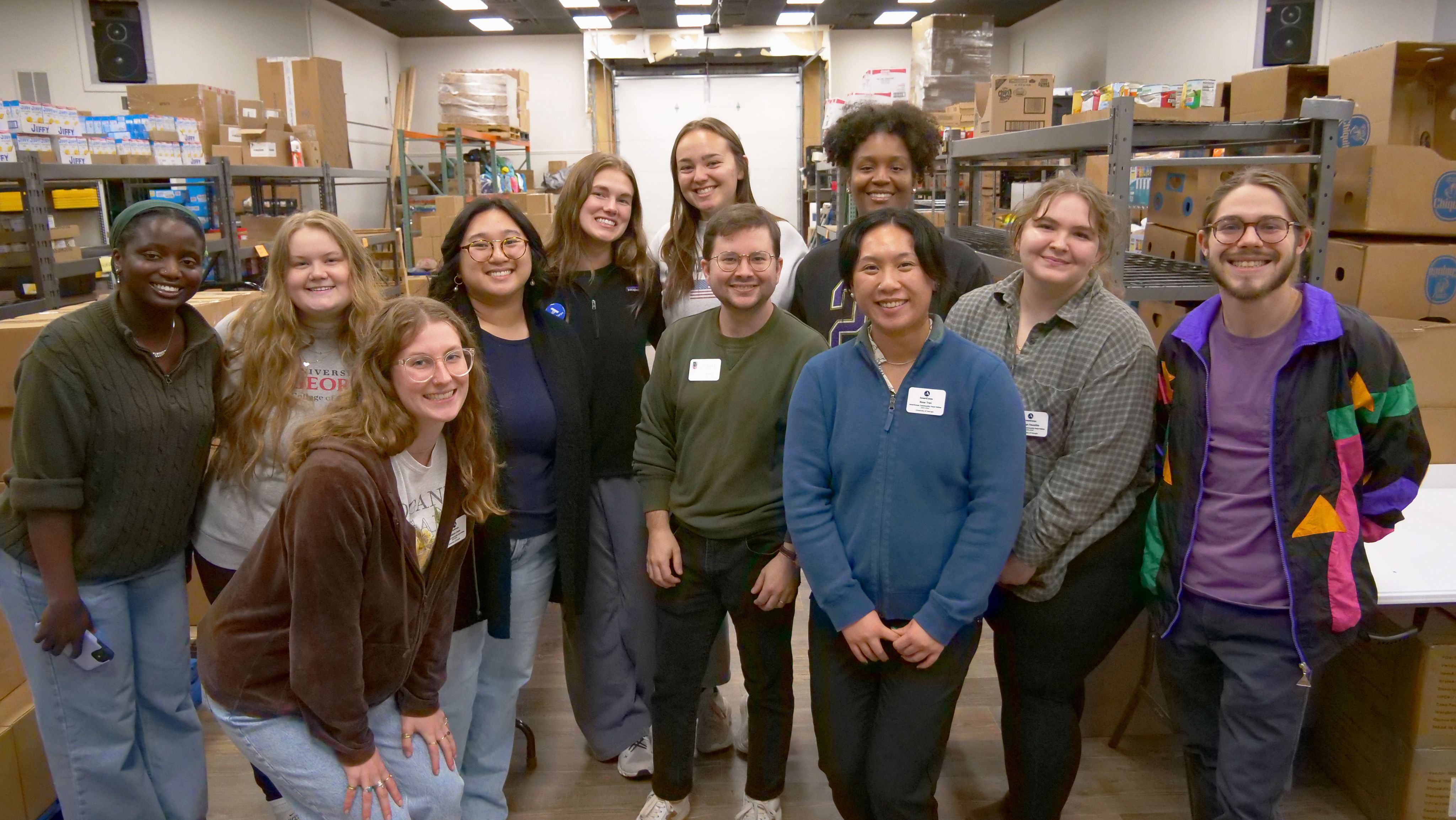 Coleman Allums, coordinator, and the food fellows pose for a photo at City of Refuge.