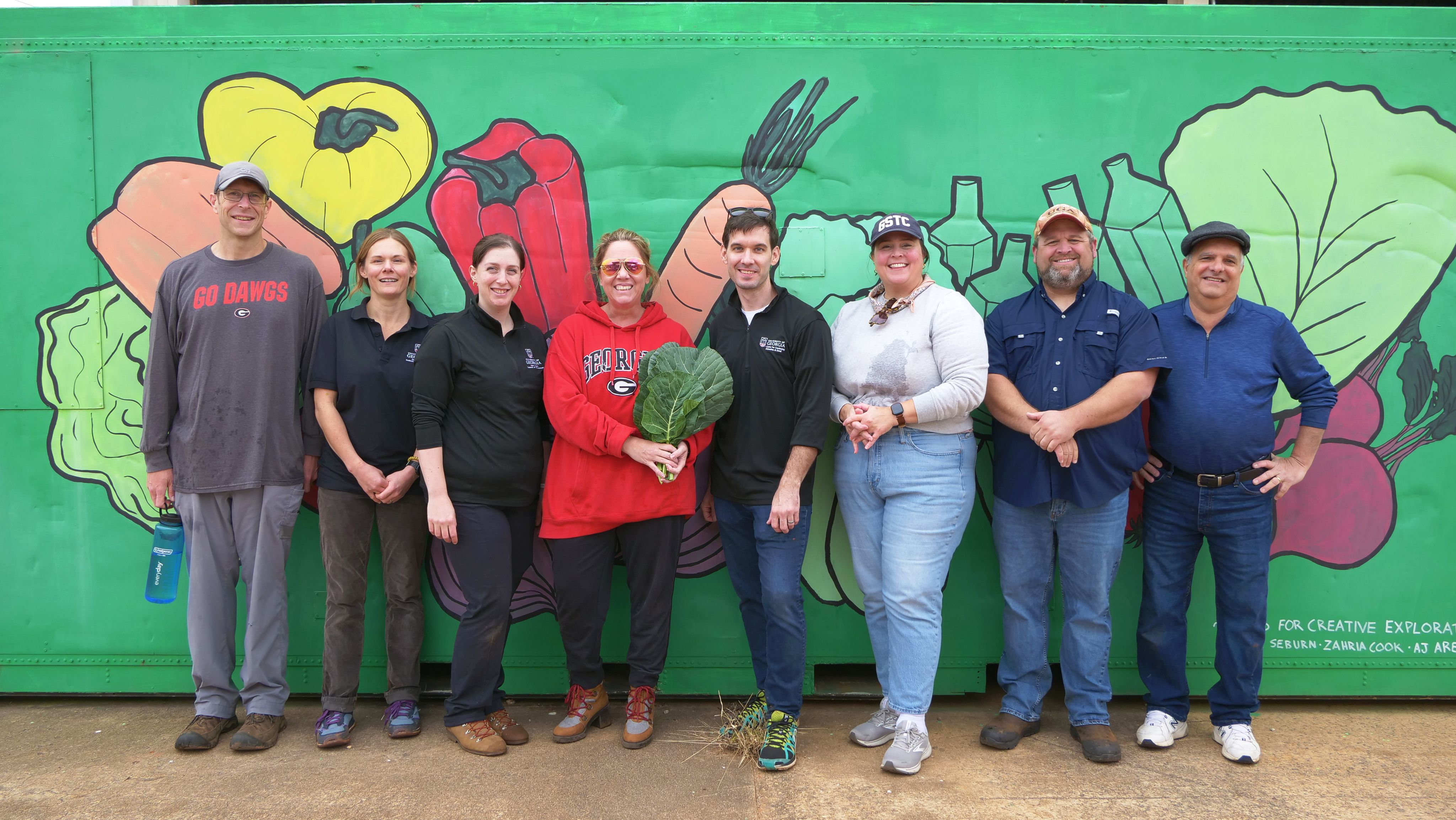 PSO Faculty and Staff that joined the PSO Week of Service to harvest collards pose at UGArden.