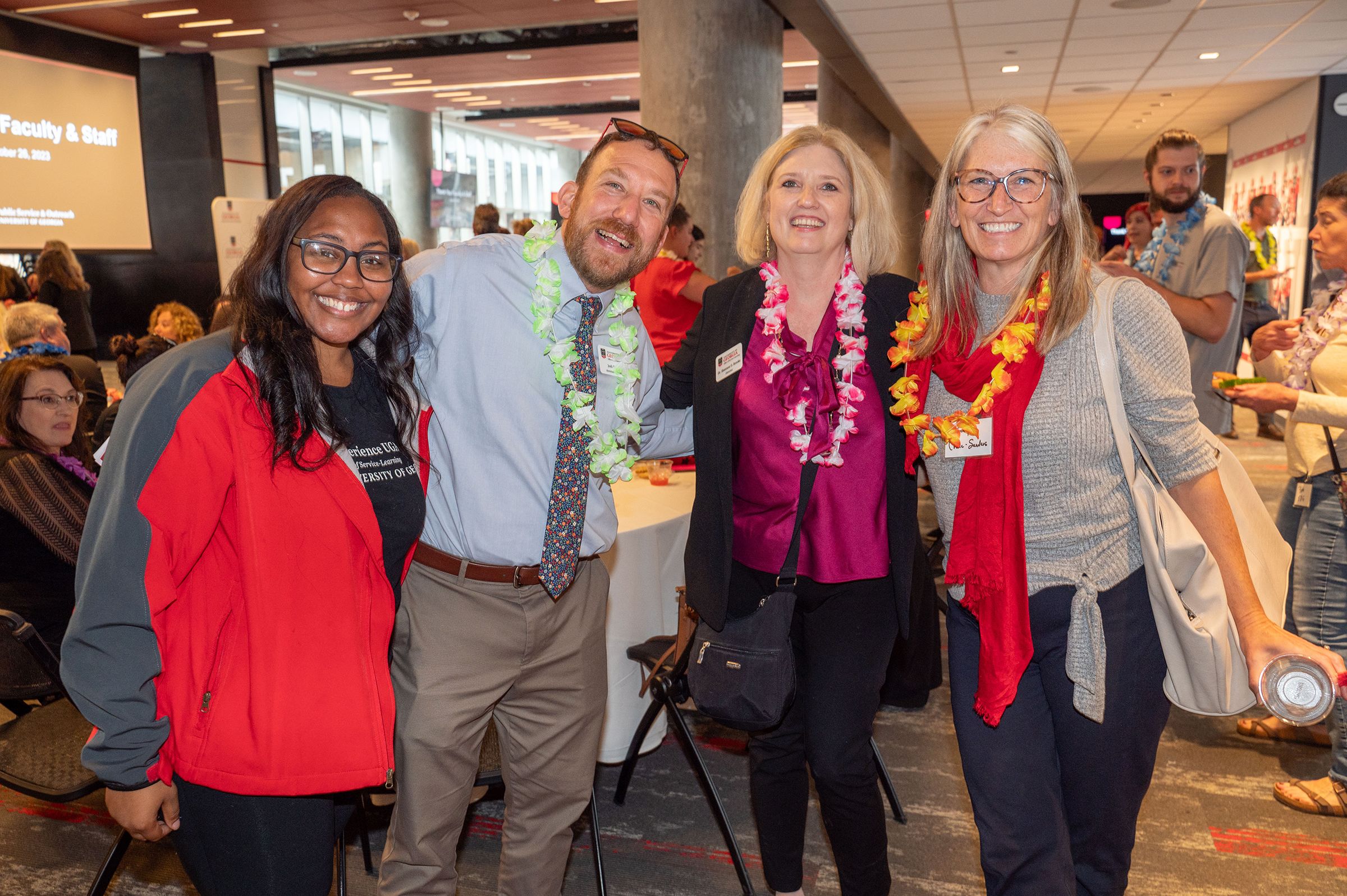 Aiyana Egins, Josh Podvin, Shannon Brooks, and Jennifer Cruse-Sanders, the director of the State Botanical Garden, pose for a photo at the PSO faculty and staff appreciation event.