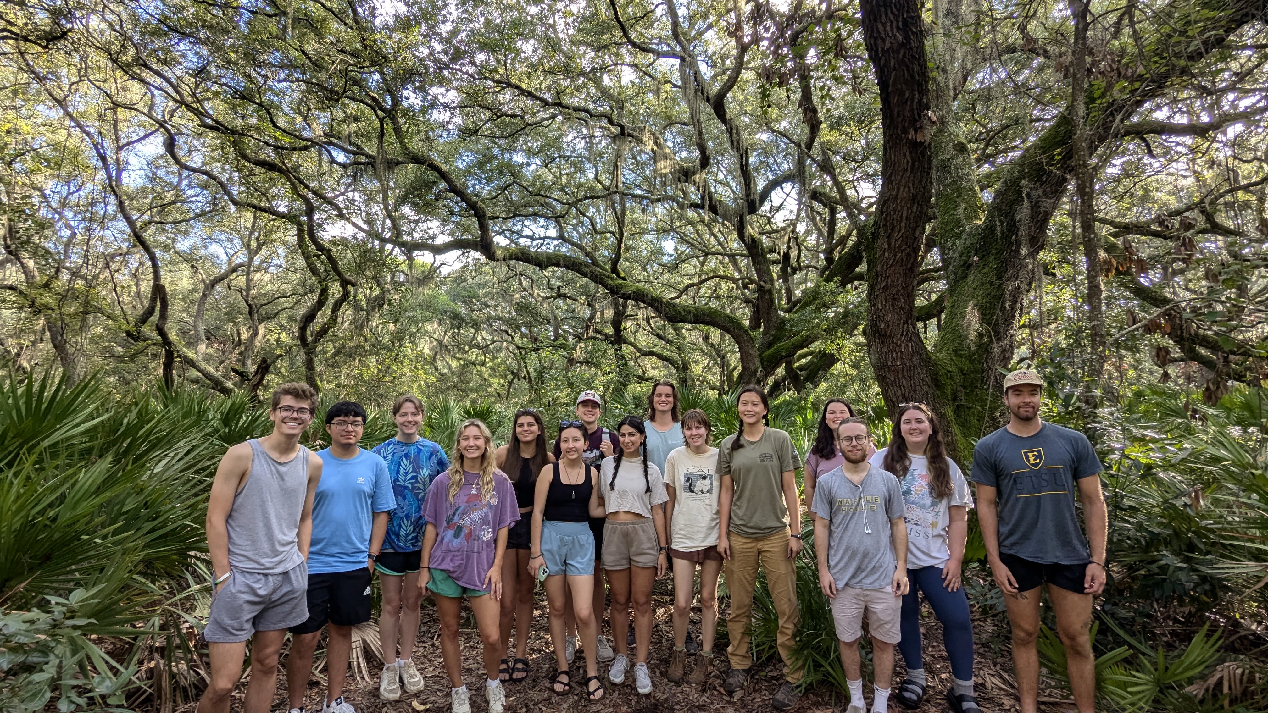 Students pose for a photo while hiking on Cumberland Island
